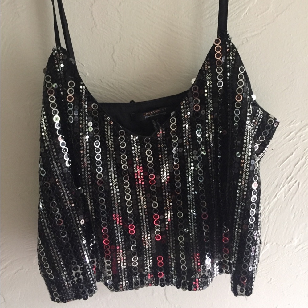 Medium sequenced spaghetti strap shirt.